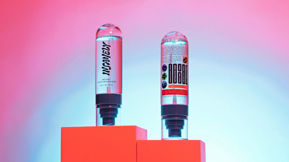Two bottles of the Insanely Clean Instant Moisturizing Mist displayed on a pedestal.