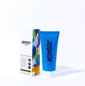 Insanely Clean's Day 'N' Nite Face Wash bottle sits beside its box and sleek packaging.