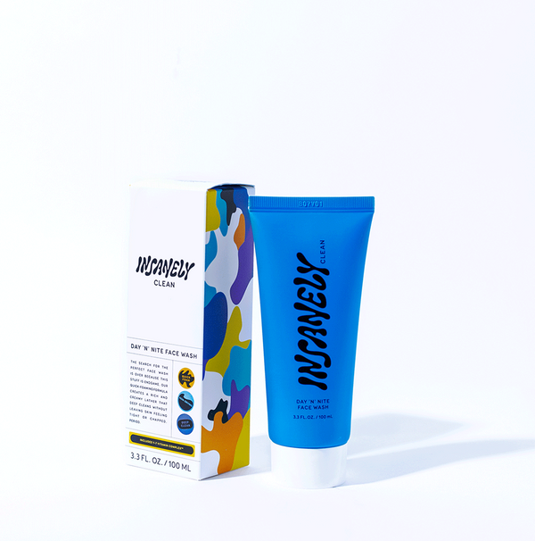 Insanely Clean's Day 'N' Nite Face Wash bottle sits beside its box and sleek packaging.