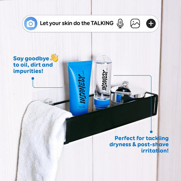 The Insanely Clean Day 'N' Nite Face Wash and Instant Moisturizing Mist resting on a shelf in the shower.