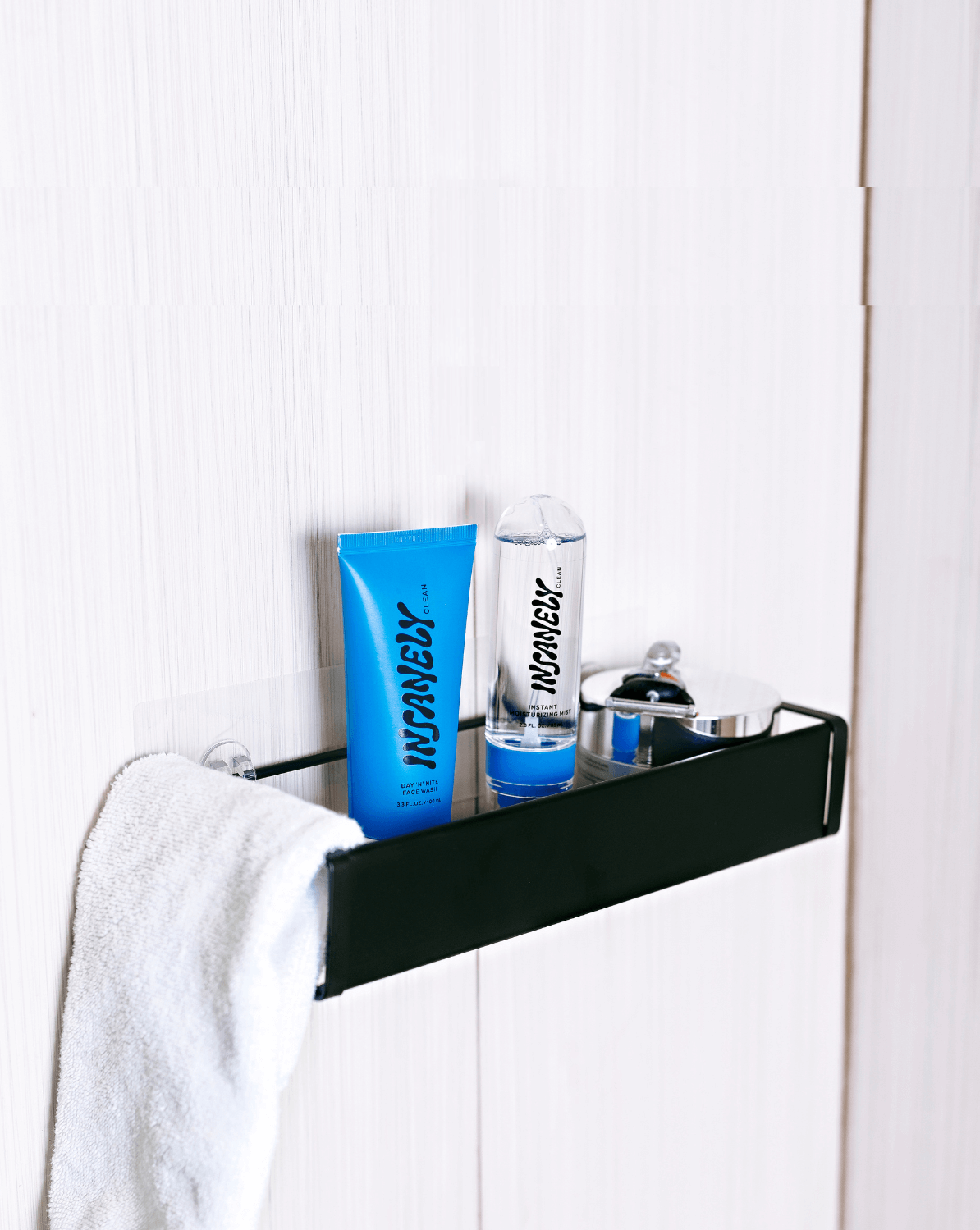 Men's skincare set placed in the bathroom for men to easily use the best natural face wash for men during their shower experience.