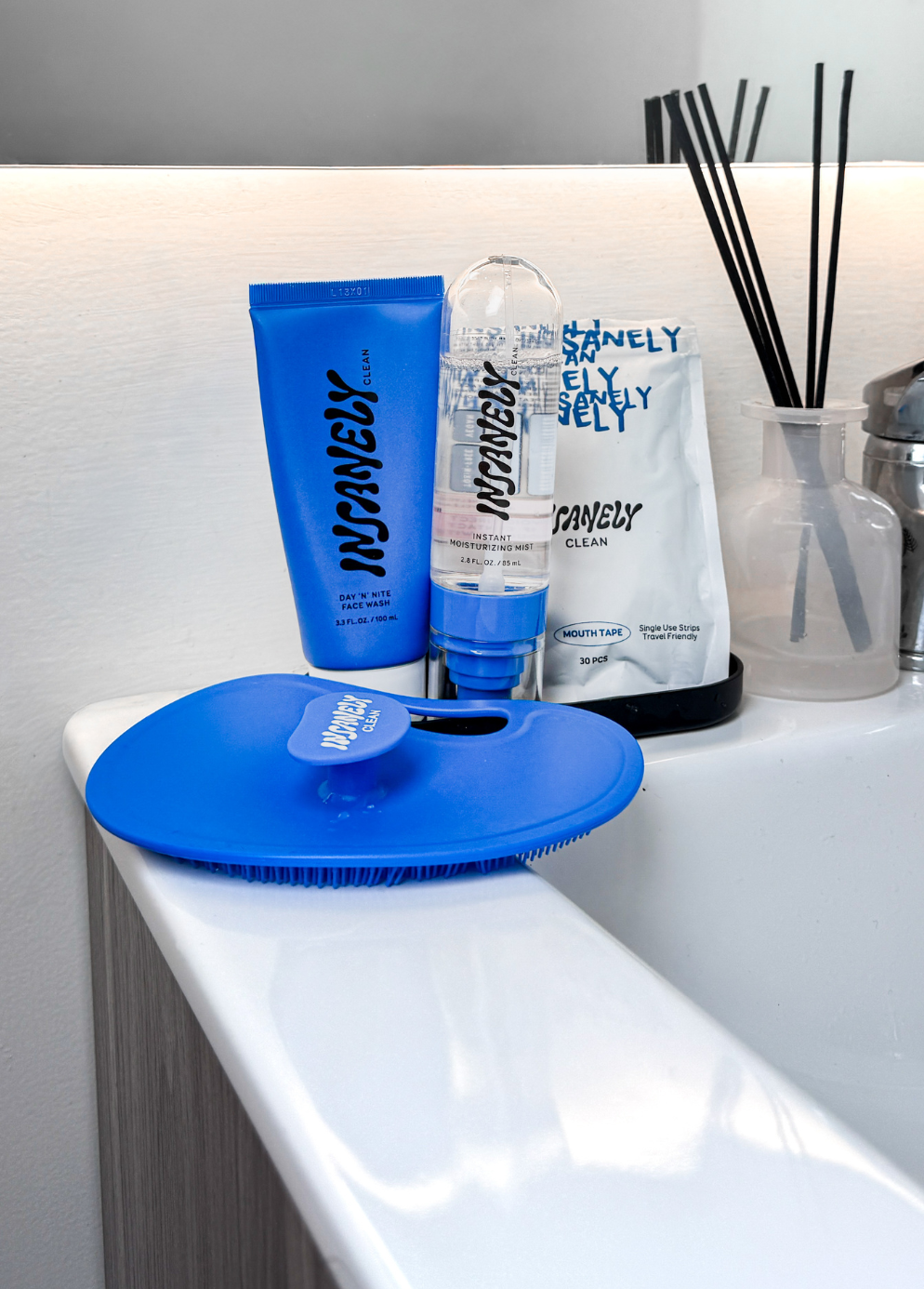 Insanely Clean Day 'N' Nite Face Wash, Insanely Clean Instant Moisturizing Mist, Insanely Clean Body Scrubber, and Insanely Clean Mouth Tape